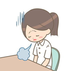 ため息をついて落ち込んでいる看護師